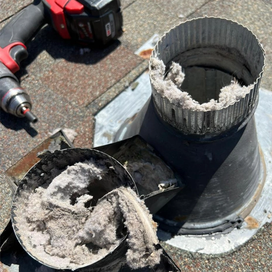 Our expert doing Dryer Vent Cleaning in Conyers, GA